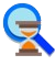 Magnifying glass examining a globe.